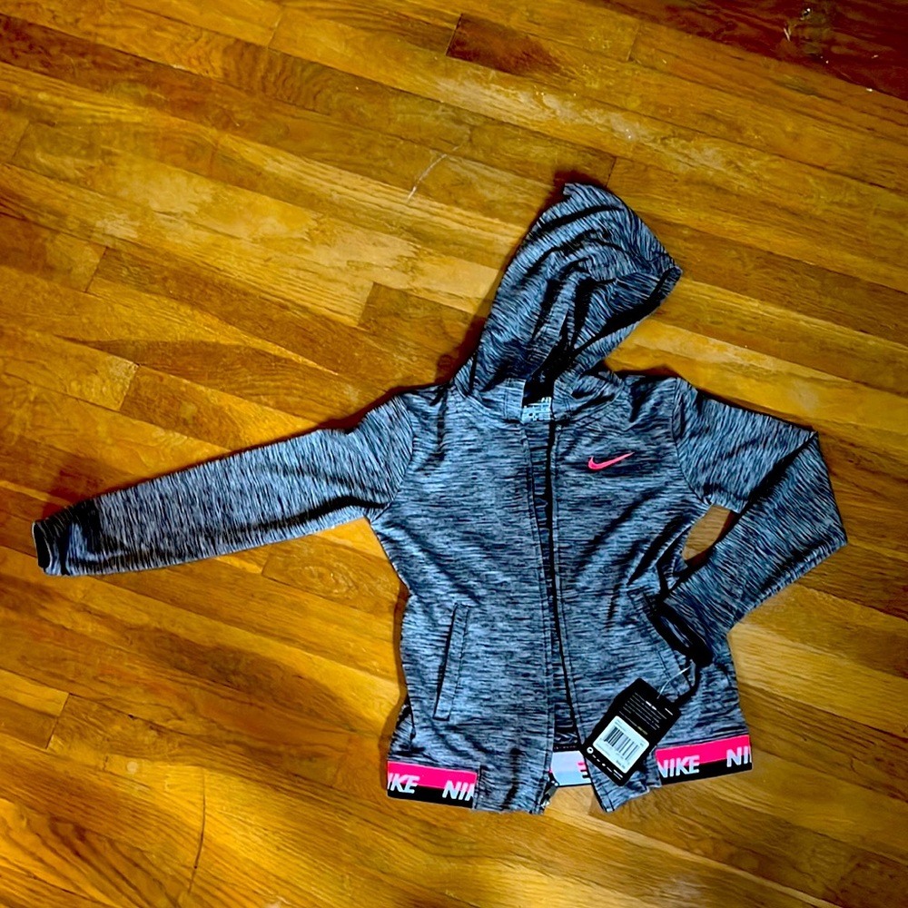 Girls Youth size 6 brand new Nike zip up hoody. Never worn, dri-fit material.